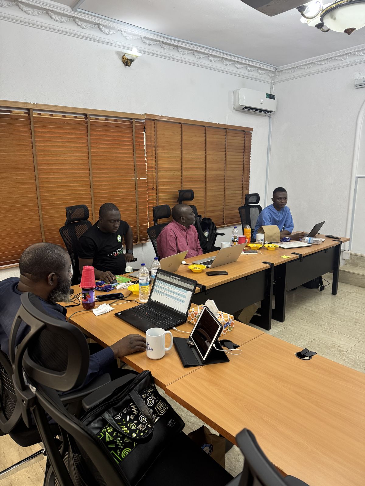 Participants collaborating during live ICT training