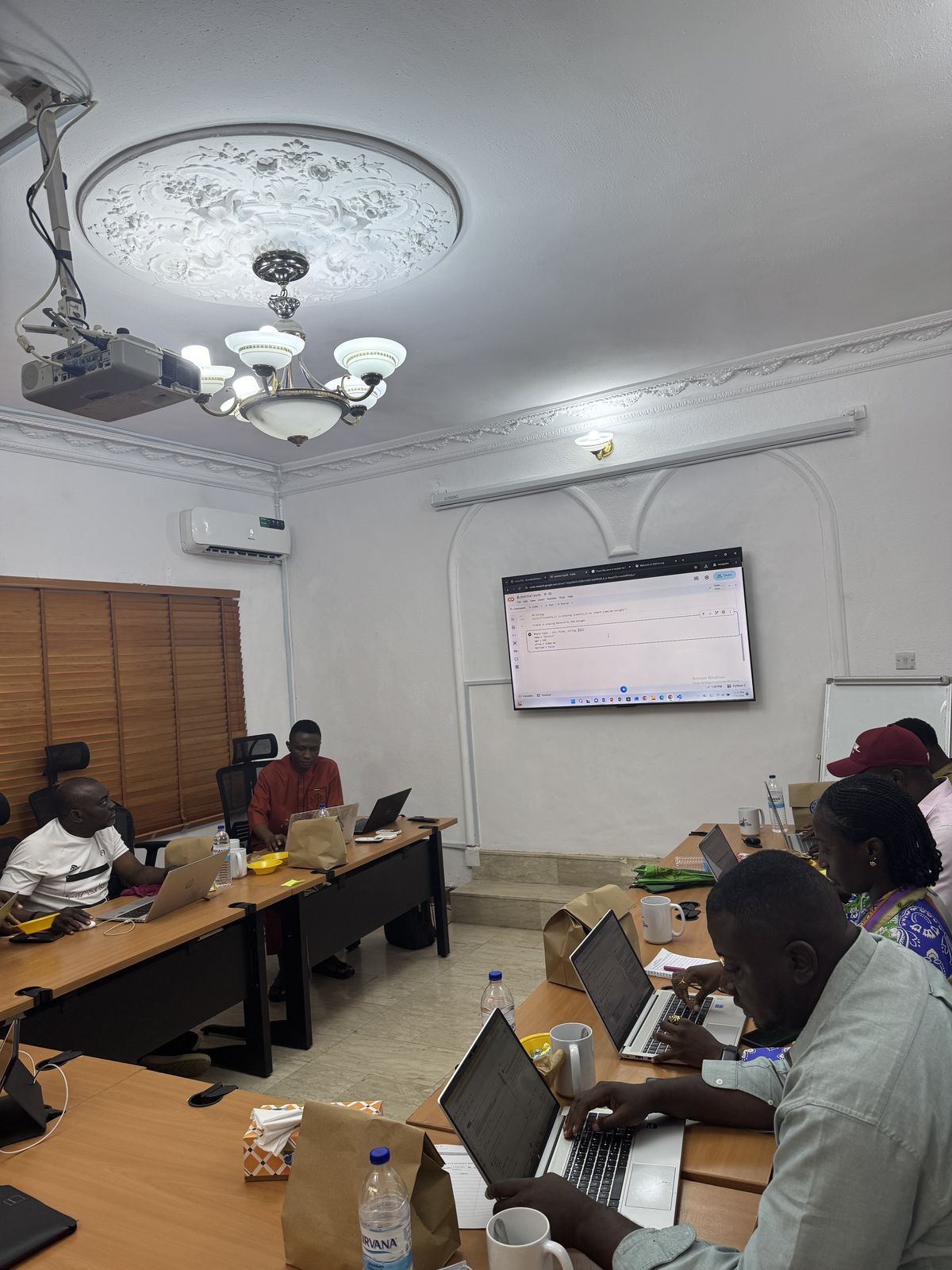 Participants practising on laptops during LIRS training